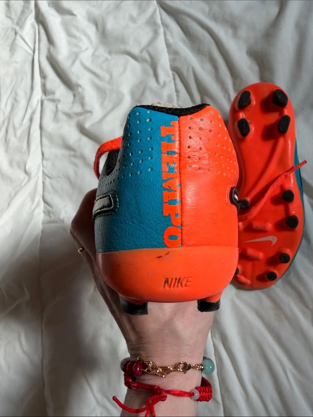 Nike Kids Soccer Cleats in Blue and Bright Orange